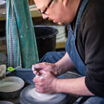 Richard Heeley at work in his pottery in Shropshire Feb 2018